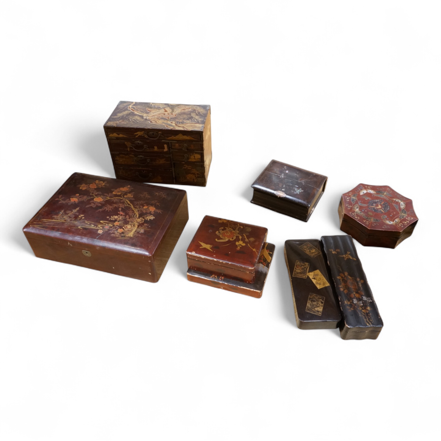 A group of 19th/20th century Japanese lacquer boxes and a similar tabletop cabinet, the latter 31cm wide